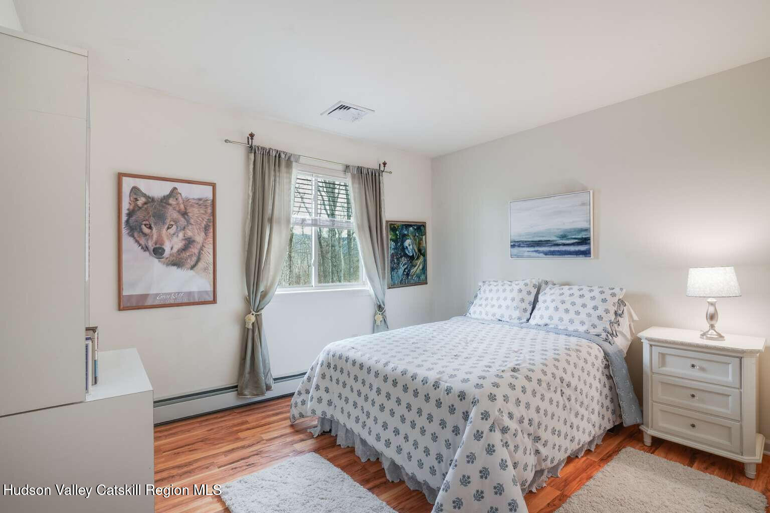 257 Bruynswick Road New Paltz, NY 12561 - Photo 15 of 23 a bedroom with a bed and a window