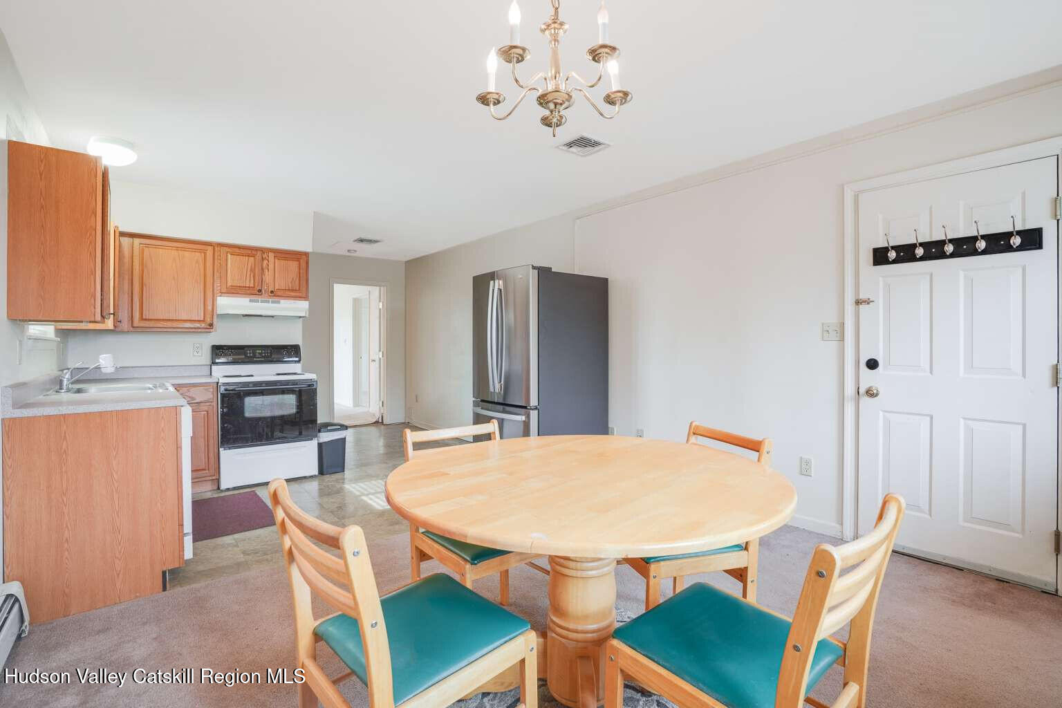 257 Bruynswick Road New Paltz, NY 12561 - Photo 20 of 23 a view of a dining room with furniture