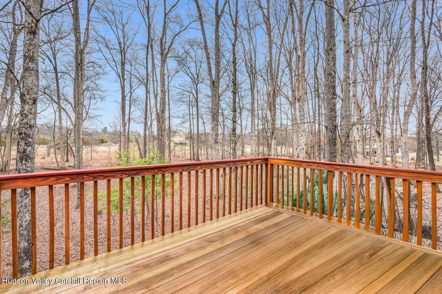 257 Bruynswick Road New Paltz, NY 12561 - Photo 4 of 23 a view of wooden balcony with wooden floor and fence