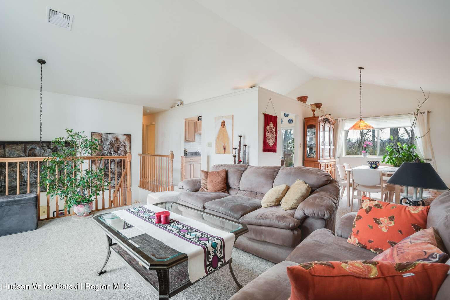 257 Bruynswick Road New Paltz, NY 12561 - Photo 5 of 23 a living room with furniture and a wooden floor