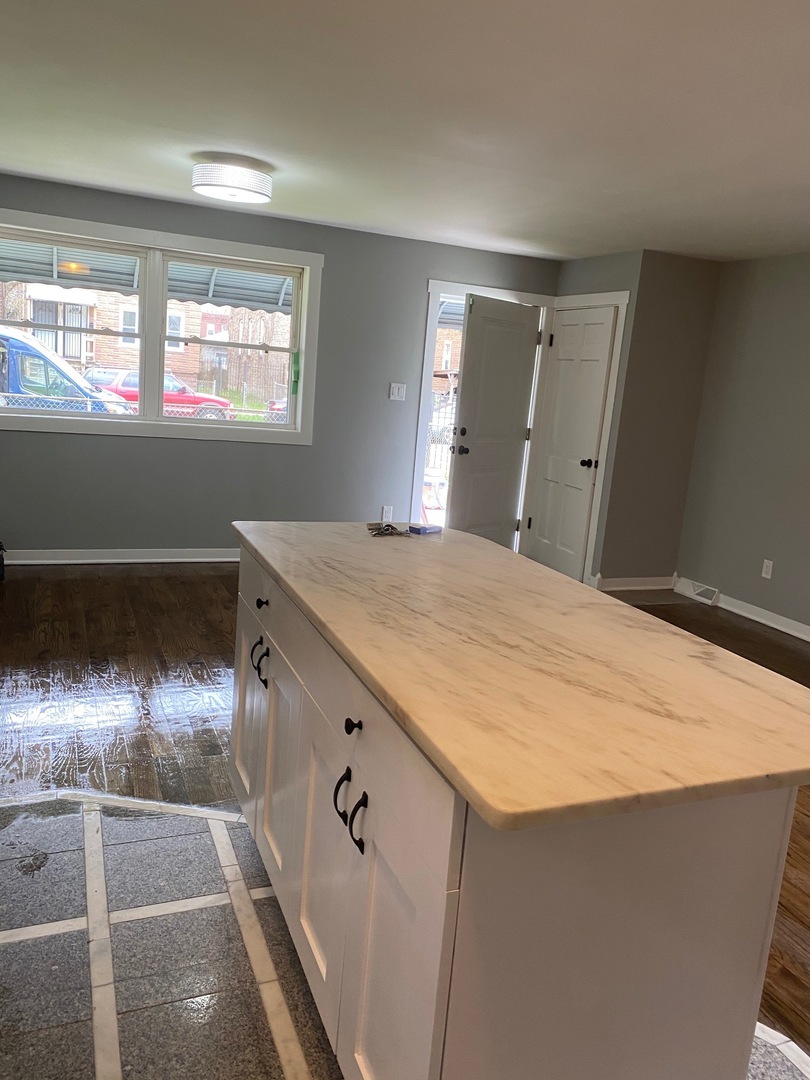 6732 South Peoria Street Chicago, IL 60621 - Photo 6 of 16 a room with a large window
