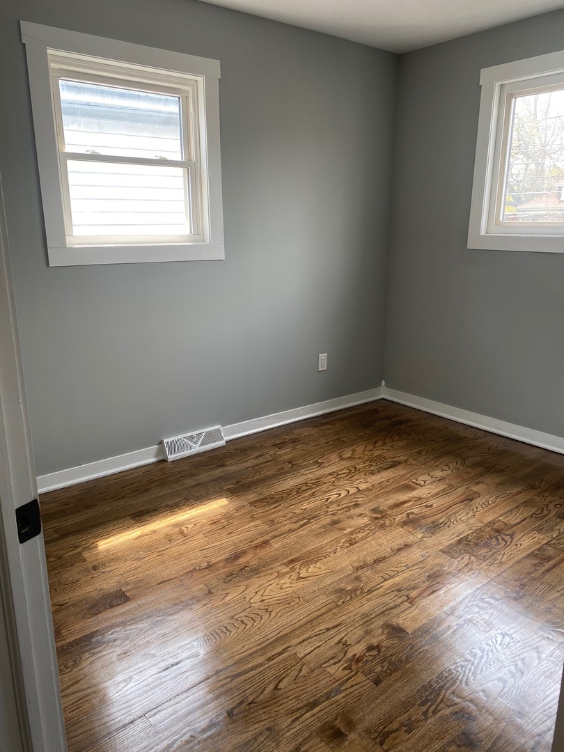 6732 South Peoria Street Chicago, IL 60621 - Photo 10 of 16 a view of empty room with window