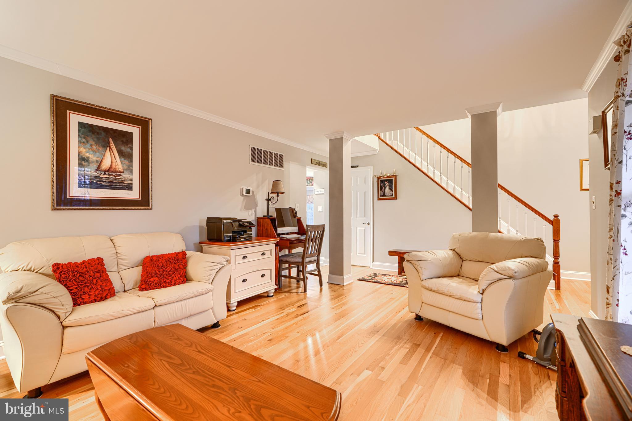 3 Horn Point Court Baltimore, MD 21234 - Photo 15 of 83 a living room with furniture and a wooden floor
