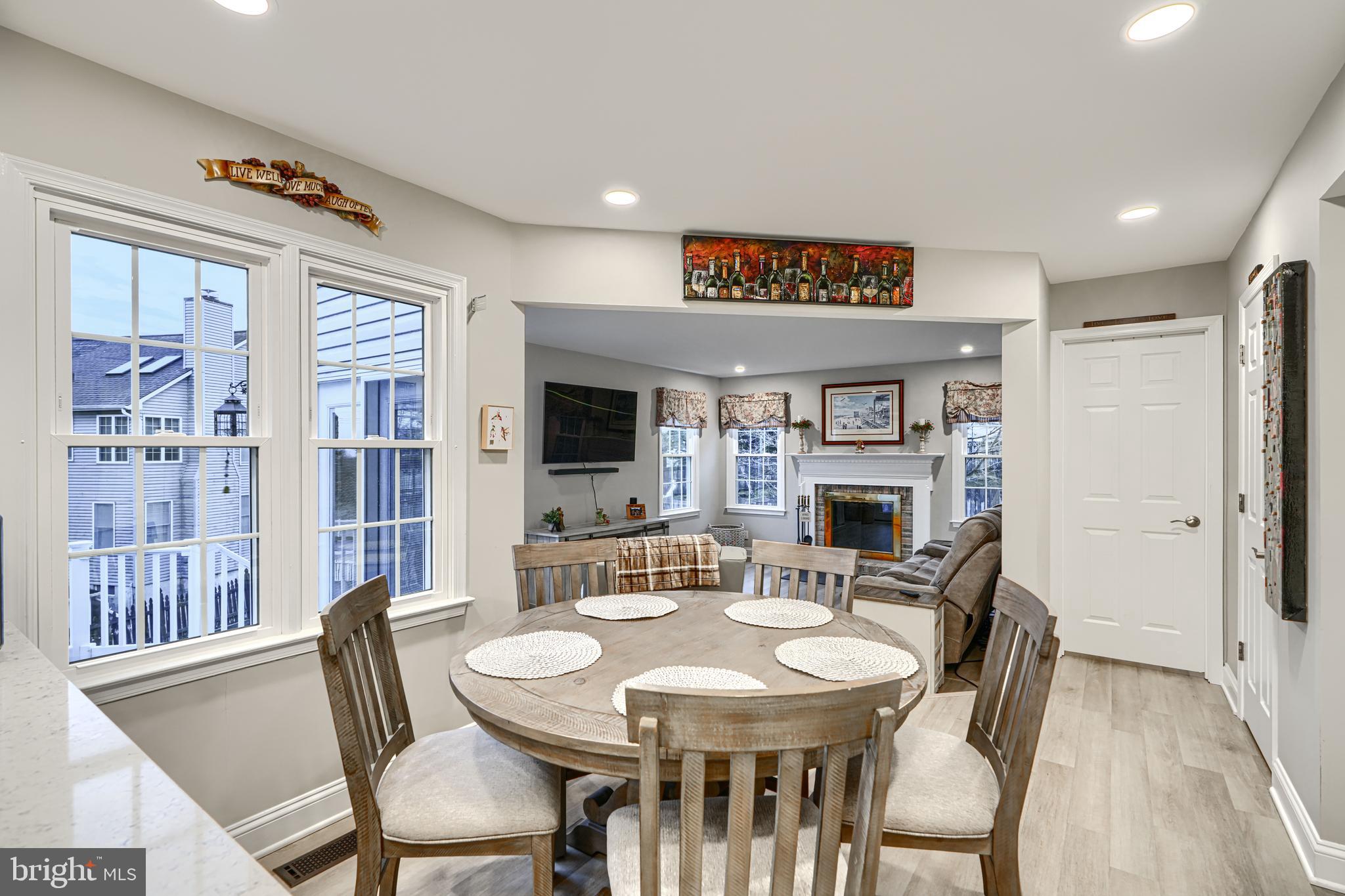 3 Horn Point Court Baltimore, MD 21234 - Photo 16 of 83 a view of a a dining room with furniture window and wooden floor