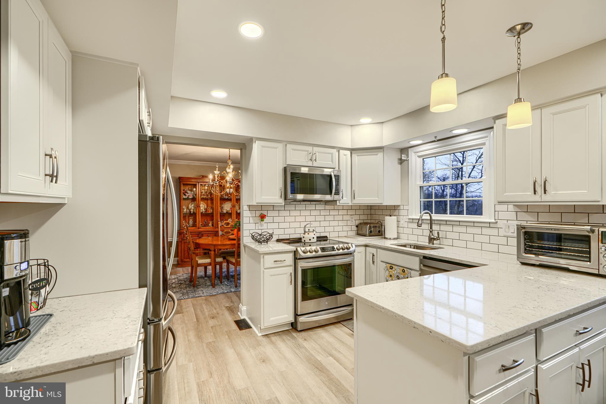 3 Horn Point Court Baltimore, MD 21234 - Photo 24 of 83 a kitchen with stainless steel appliances granite countertop a stove and a sink