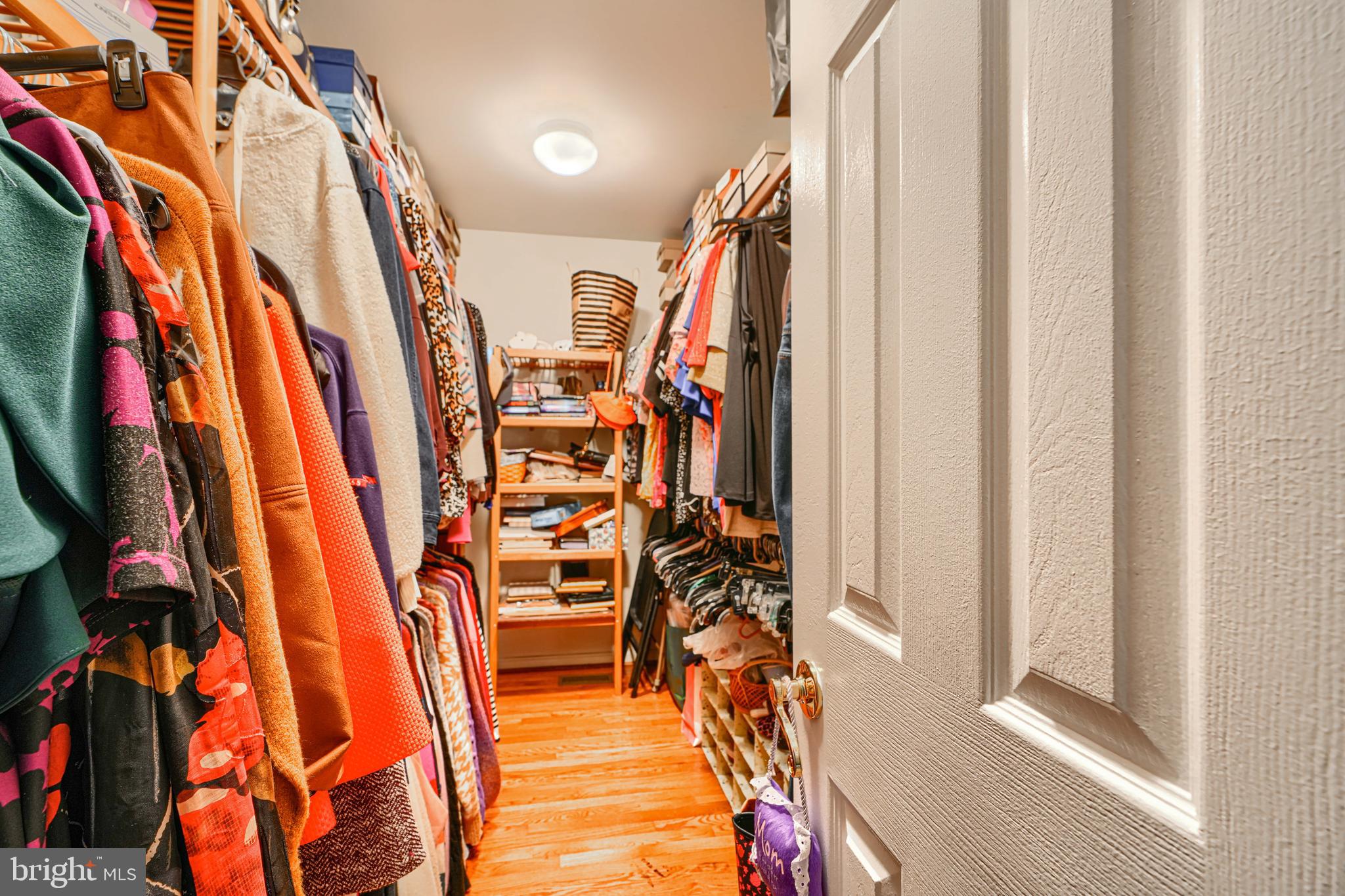3 Horn Point Court Baltimore, MD 21234 - Photo 41 of 83 a view of walk in closet with clothes