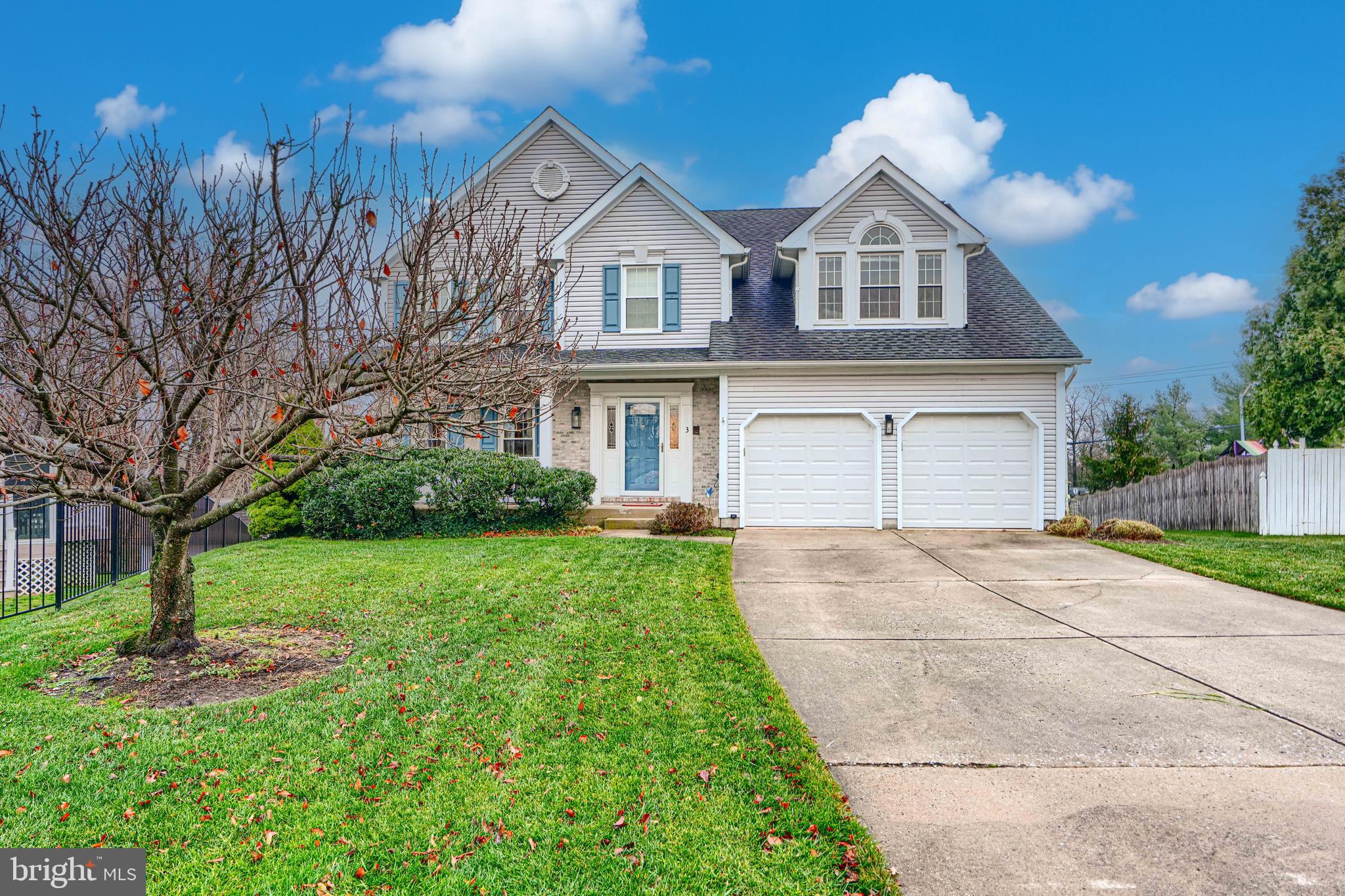 3 Horn Point Court Baltimore, MD 21234 - Photo 5 of 83 a front view of a house with a yard and trees