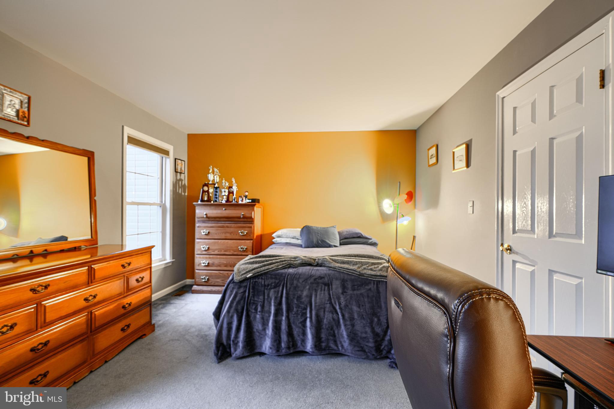 3 Horn Point Court Baltimore, MD 21234 - Photo 57 of 83 a bedroom with a bed and large windows