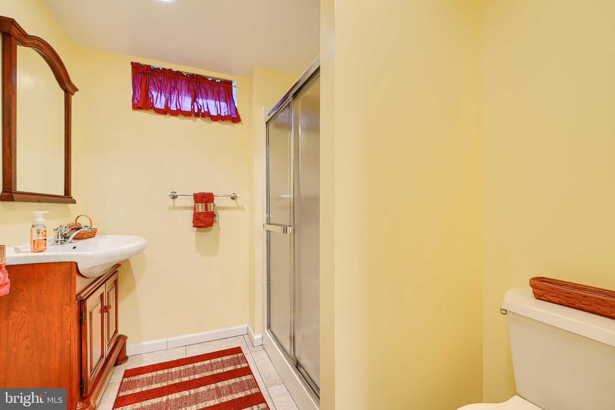 3 Horn Point Court Baltimore, MD 21234 - Photo 67 of 83 a bathroom with a sink and a toilet