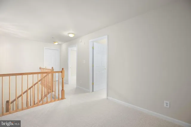 a view of hallway with stairs