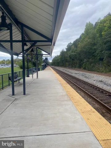 a view of railway station with sitting area