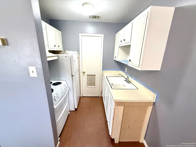 view of living room with washer and dryer