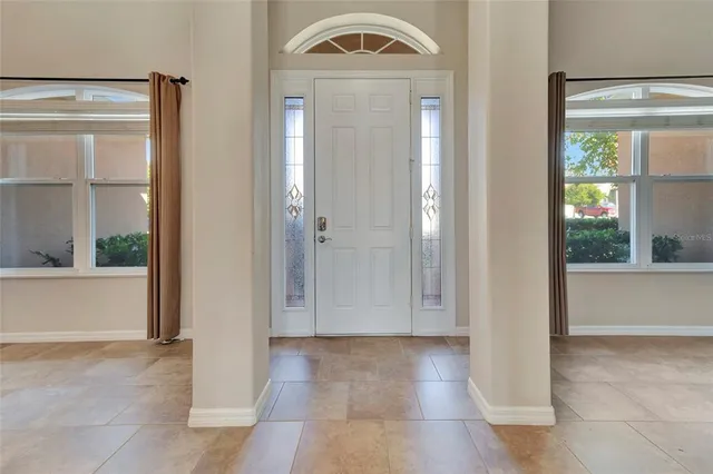 a view of a bathroom with a glass door and a shower