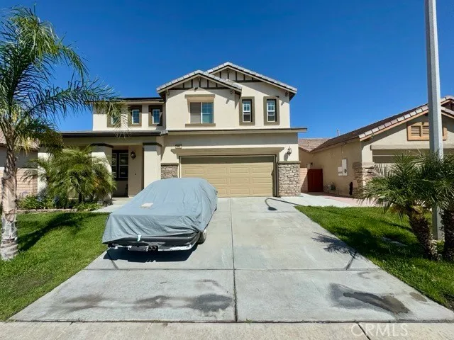 a house view with a garden space