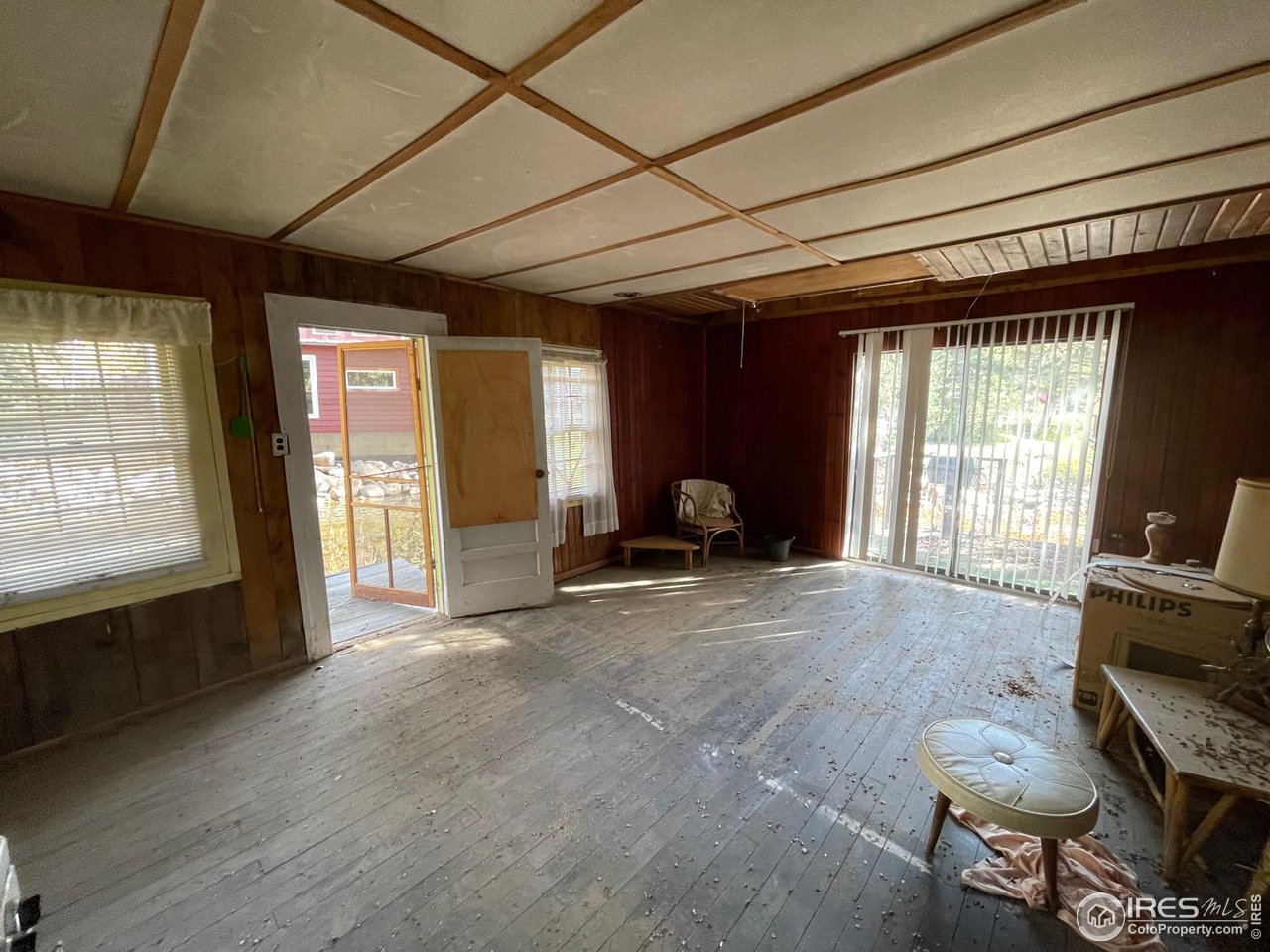 2203 Riverside Drive Lyons, CO 80540 - Photo 6 of 16 a view of livingroom with furniture and windows