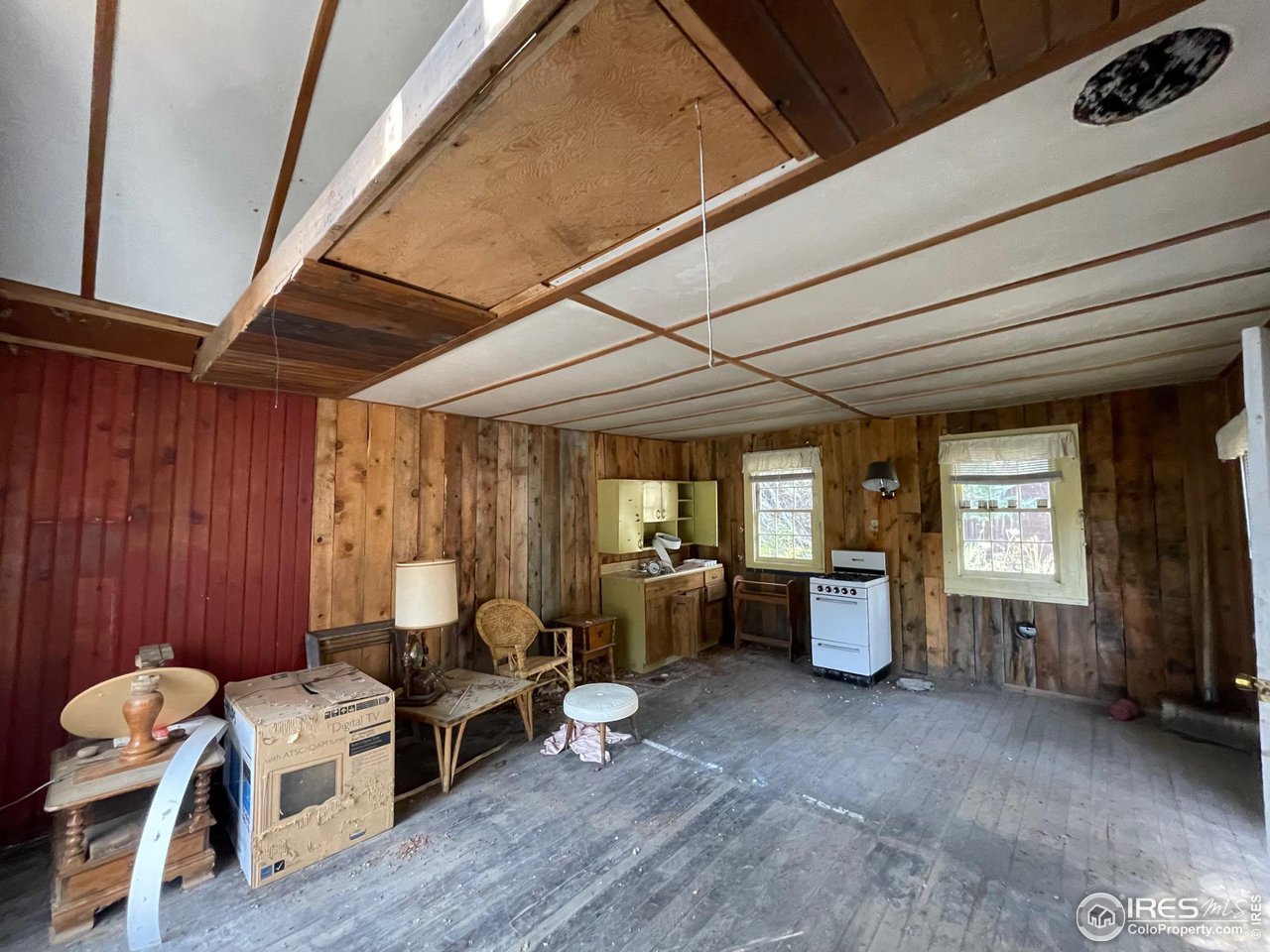 2203 Riverside Drive Lyons, CO 80540 - Photo 10 of 16 a living room with furniture window and wooden floor