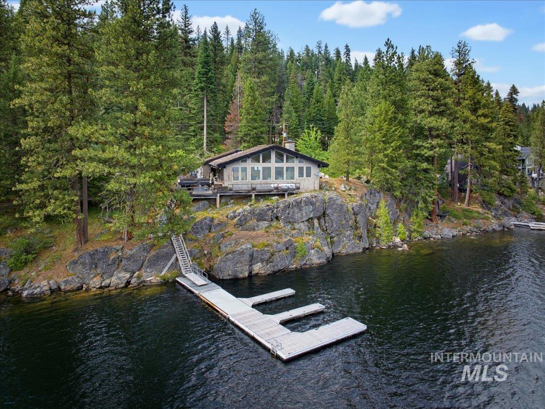 3800 Warren Wagon Road McCall, ID 83638 - Photo 3 of 50 Waterfront property featuring a private dock system, a multi-level deck, and expansive windows
