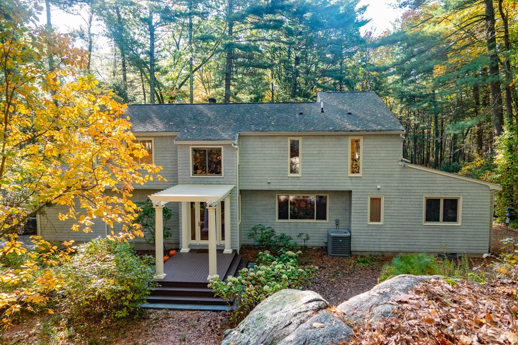 50 Old Orchard Road Sherborn, MA 01770 - Photo 1 of 26 front view of a house with a yard