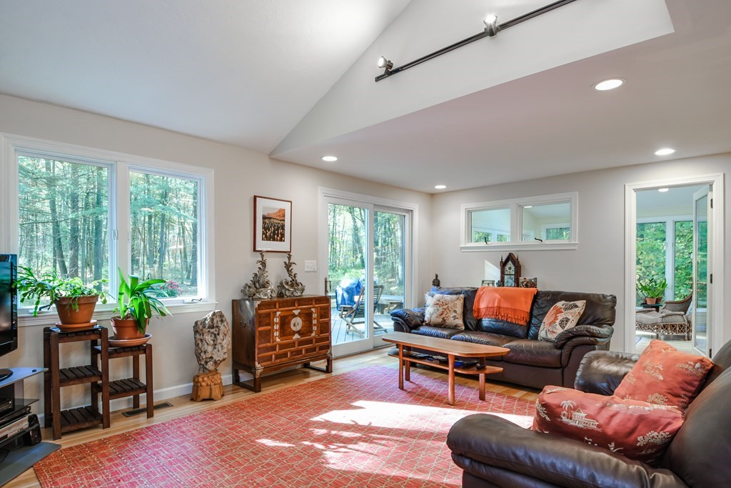 50 Old Orchard Road Sherborn, MA 01770 - Photo 13 of 26 a living room with furniture a window and a flat screen tv