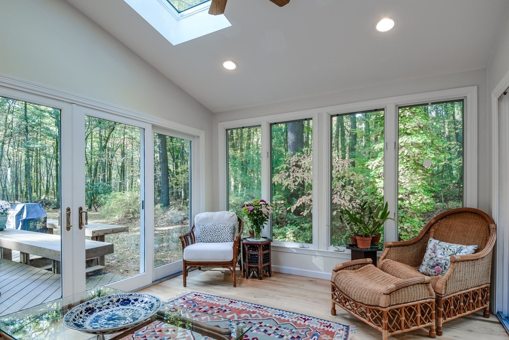 50 Old Orchard Road Sherborn, MA 01770 - Photo 15 of 26 a living room with furniture and a floor to ceiling window
