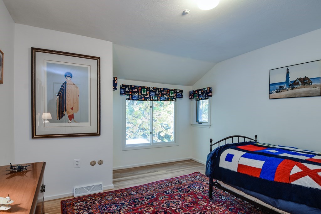 50 Old Orchard Road Sherborn, MA 01770 - Photo 21 of 26 a bedroom with a bed and window