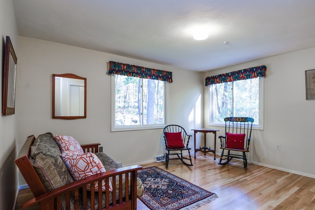 50 Old Orchard Road Sherborn, MA 01770 - Photo 22 of 26 a living room with furniture and a window