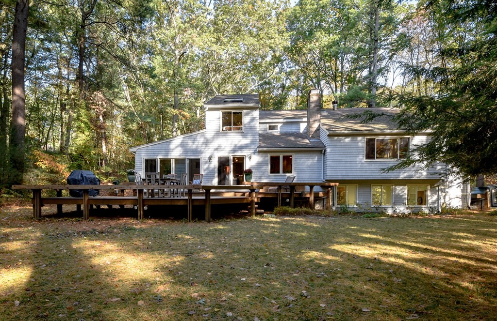 50 Old Orchard Road Sherborn, MA 01770 - Photo 3 of 26 a front view of a building with a garden