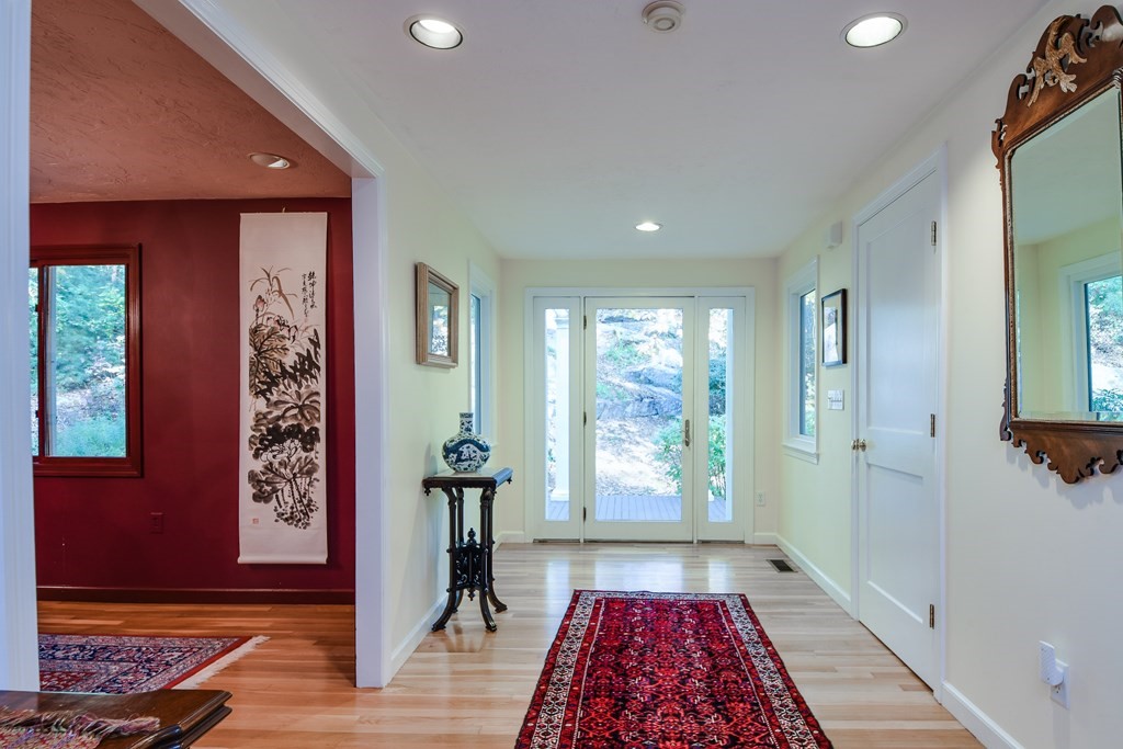 50 Old Orchard Road Sherborn, MA 01770 - Photo 4 of 26 a view of entryway with wooden floor and a rug
