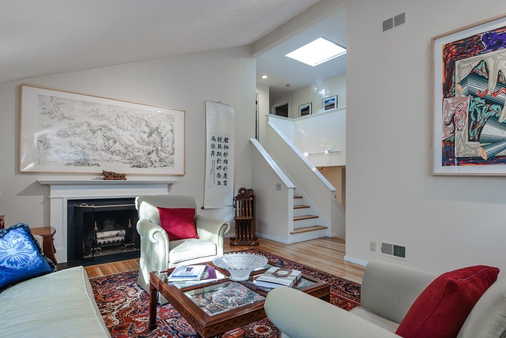 50 Old Orchard Road Sherborn, MA 01770 - Photo 6 of 26 a living room with furniture and a fireplace