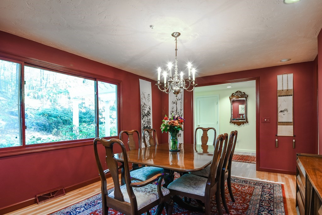 50 Old Orchard Road Sherborn, MA 01770 - Photo 8 of 26 a view of a dining room with furniture window and wooden floor