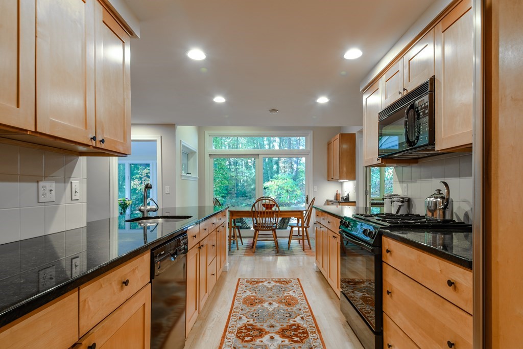 50 Old Orchard Road Sherborn, MA 01770 - Photo 9 of 26 a kitchen with granite countertop lots of counter top space