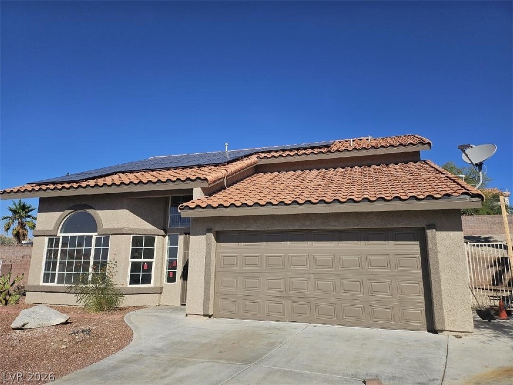 2155 Athol Way Laughlin, NV 89029 - Photo 1 of 19 This residence showcases a traditional tile roof and an attached garage.