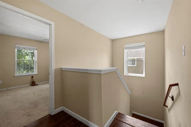 a room with furniture and a flat screen tv