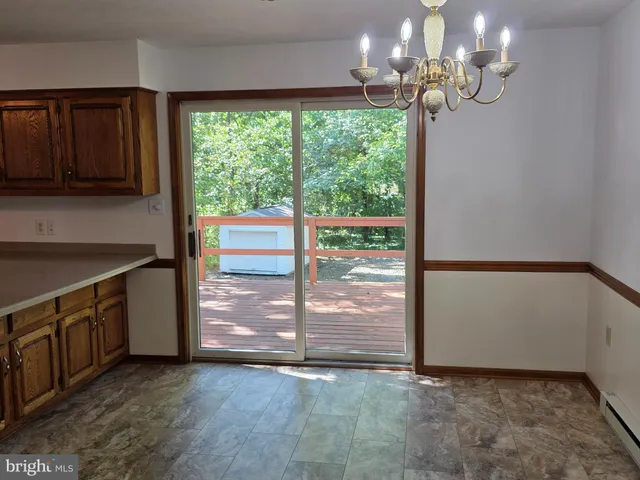 a view of a kitchen with a sink and dishwasher