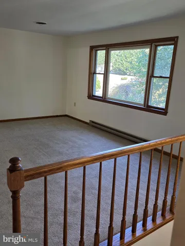 a view of staircase with window