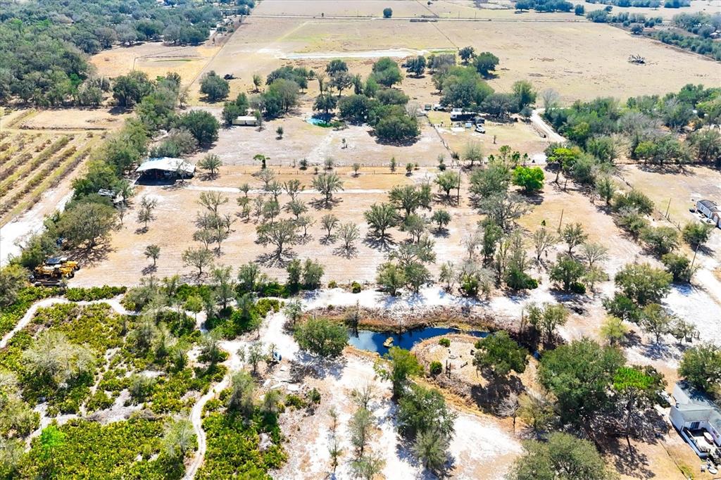 6096 Northwest Cul De Sac Road Arcadia, FL 34266 - Photo 18 of 20 a view of lot of houses with yard