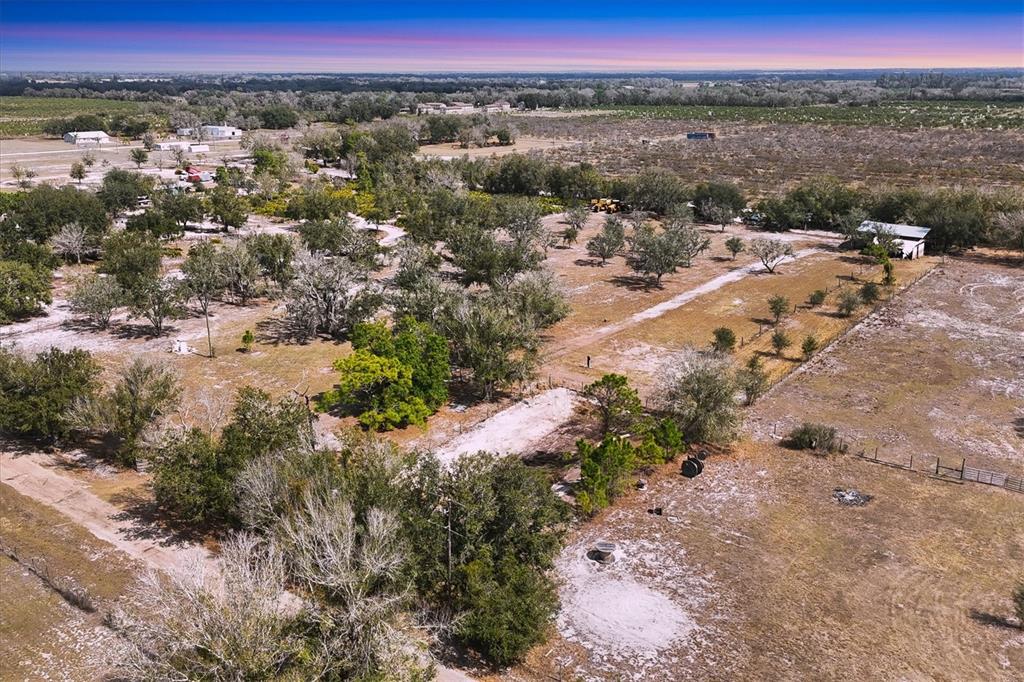 6096 Northwest Cul De Sac Road Arcadia, FL 34266 - Photo 19 of 20 a view of a city with mountains