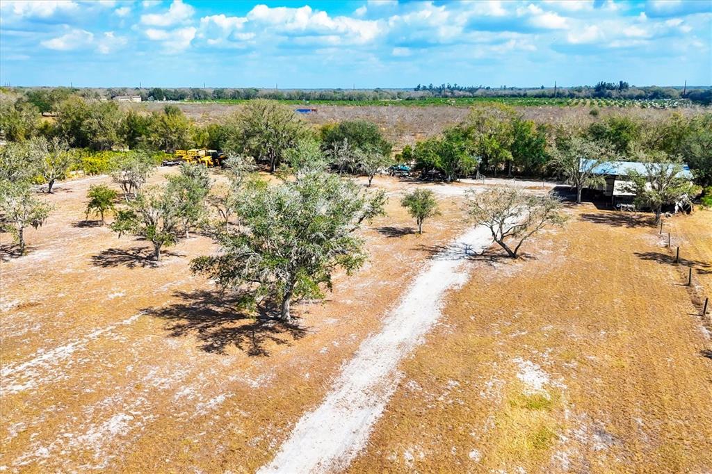 6096 Northwest Cul De Sac Road Arcadia, FL 34266 - Photo 8 of 20 a view of a lake with houses