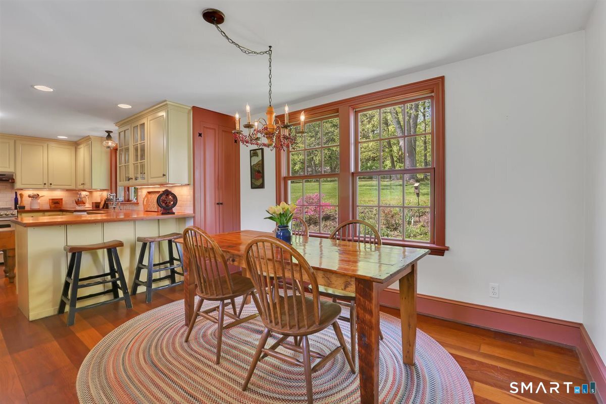 292 Parmelee Hill Road Durham, CT 06422 - Photo 12 of 39 A view from the kitchen dining area to the breakfast peninsula