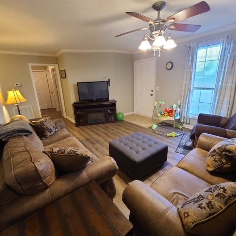 1749 Carney Winters Road Ashland City, TN 37015 - Photo 2 of 27 a bedroom with furniture and a chandelier
