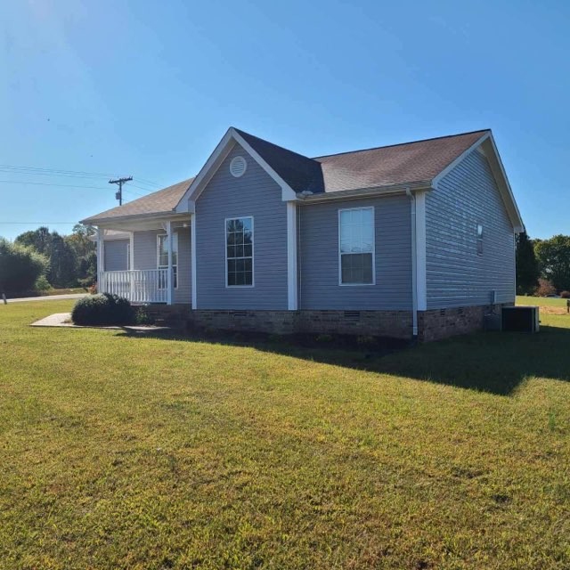 1749 Carney Winters Road Ashland City, TN 37015 - Photo 27 of 27 a view of a house with a yard