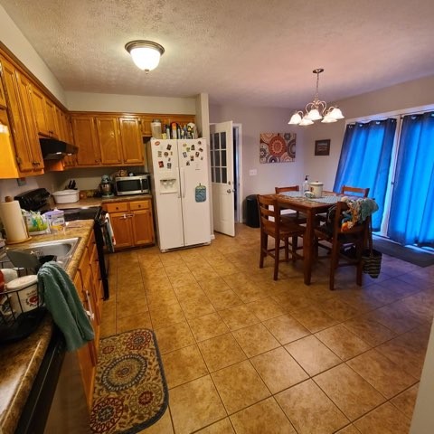 1749 Carney Winters Road Ashland City, TN 37015 - Photo 6 of 27 a view of a dining room with furniture