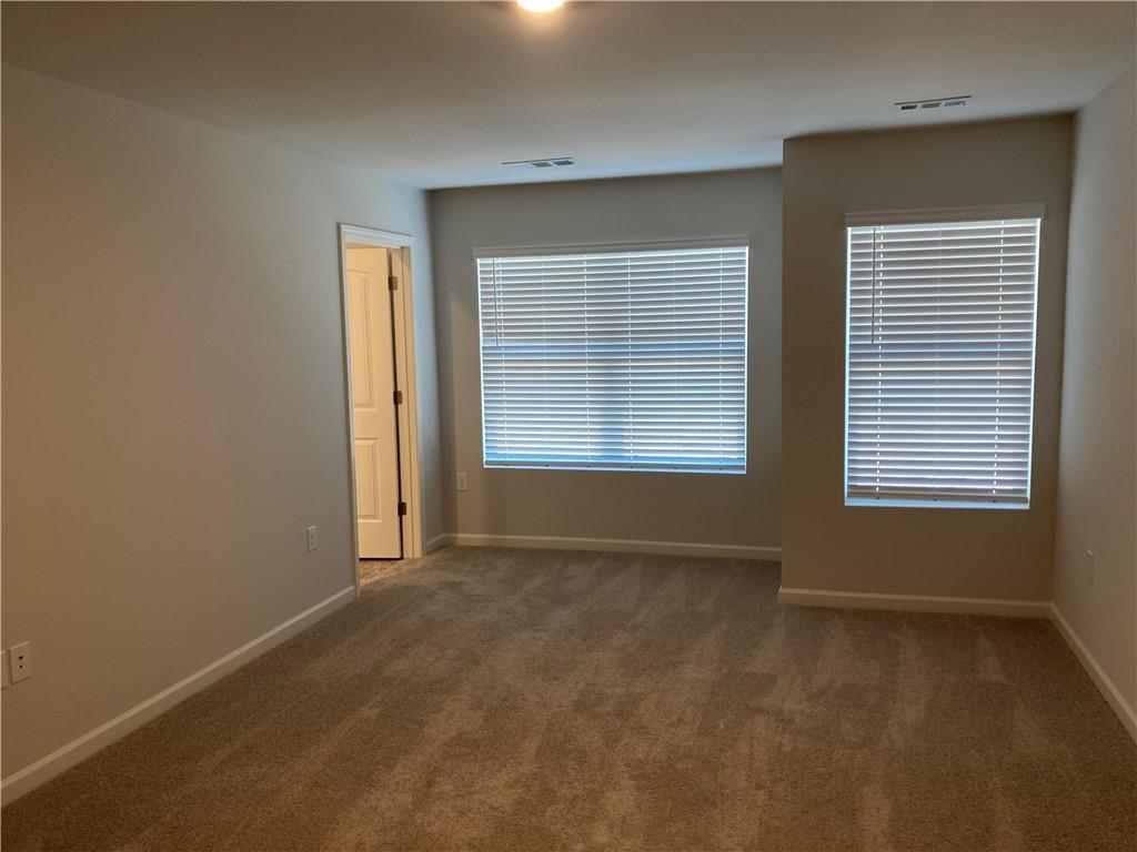 28 Rustin Ridge Dahlonega, GA 30533 - Photo 11 of 23 a view of an empty room with a window