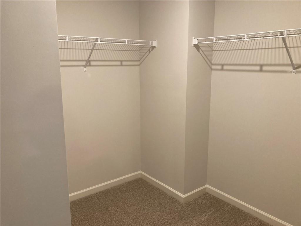 28 Rustin Ridge Dahlonega, GA 30533 - Photo 16 of 23 a view of a room with racks on the wall