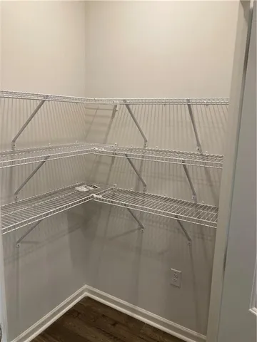 a view of a room with racks on the wall