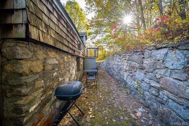 a view of a backyard with a sink and a fire pit