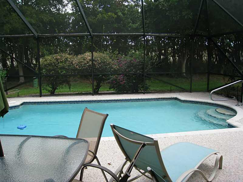 8075 Copenhagen Way Boca Raton, FL 33434 - Photo 5 of 24 a view of a chairs and table in patio