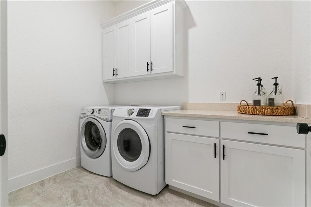 3021 Westfork Way Springtown, TX 76082 - Photo 19 of 35 a utility room with dryer and washer