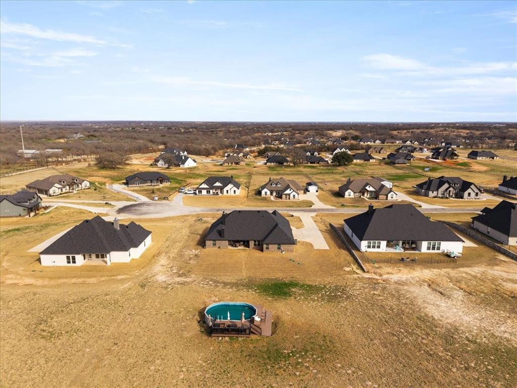 3021 Westfork Way Springtown, TX 76082 - Photo 32 of 35 an aerial view of residential houses with outdoor space