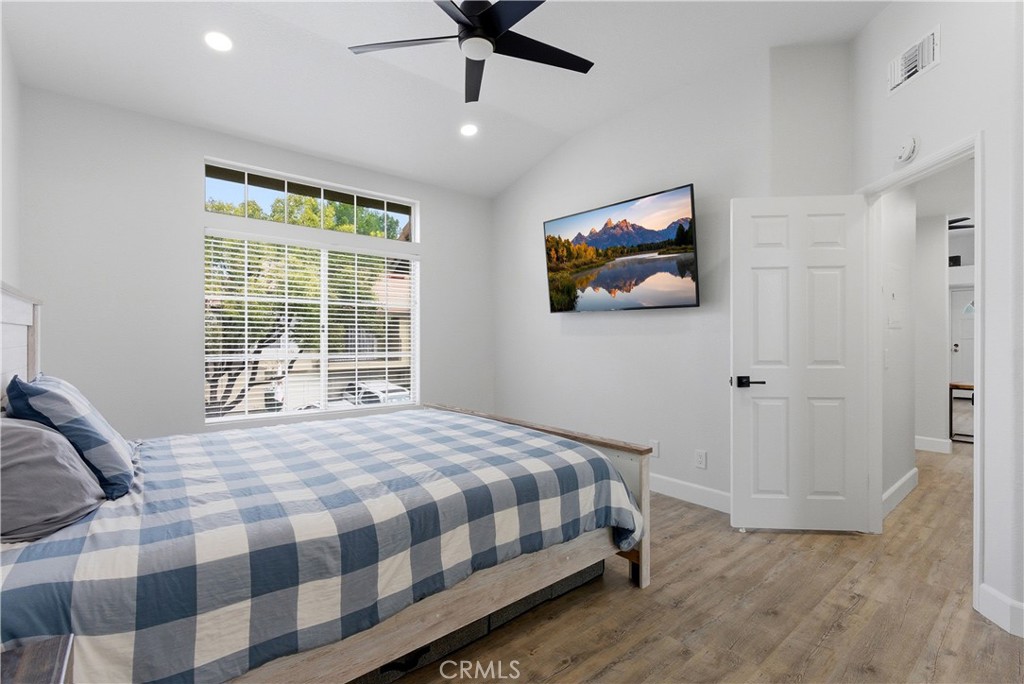 8070 East Oak Ridge Circle Anaheim Hills, CA 92808 - Photo 13 of 22 a bedroom with a bed and a window